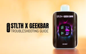 STLTH X GEEKBAR troubleshooting guide banner featuring device display and Ice Mint flavor label.