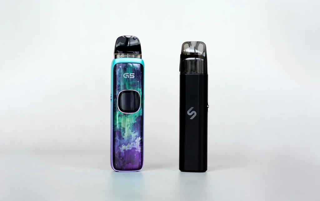 Two vape devices side by side: a colorful G5 model on the left and a sleek black STLTH model on the right.