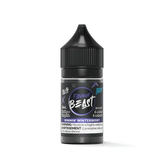 Bottle of Flavour Beast e-liquid, 30ml, 20mg nicotine, flavor: Winnin Winterberry, with warning label.